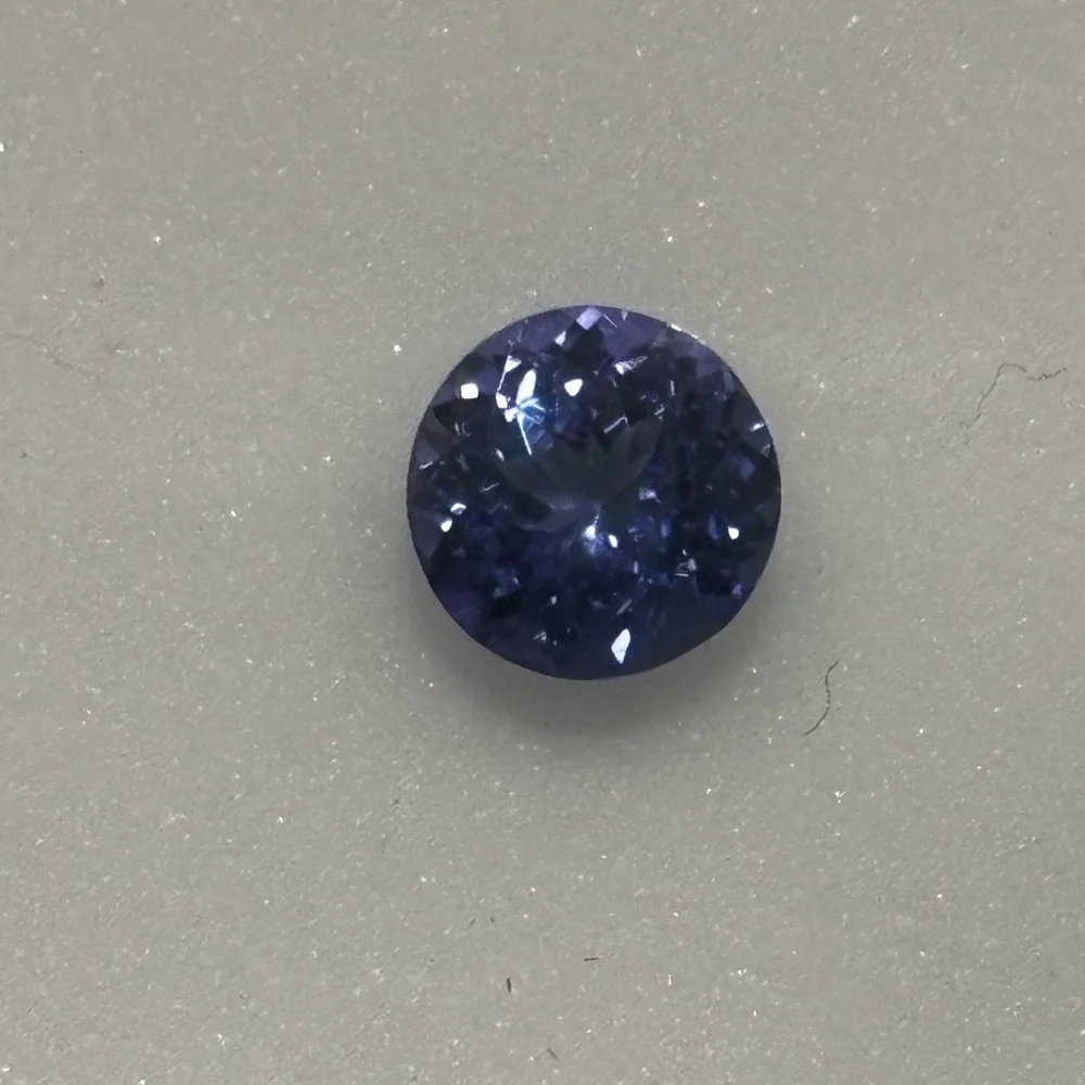 .75CT-Tanzanite-6MM Round - Picture 5 of 7